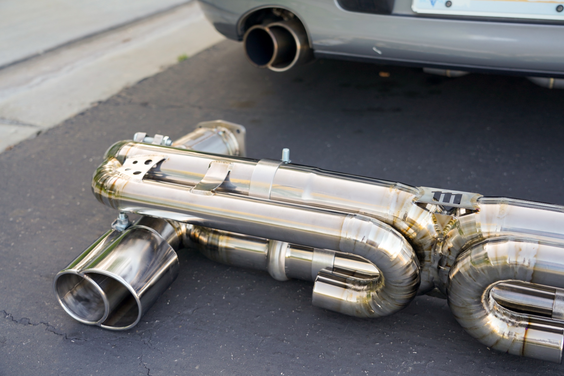 Muffler section with heat-blued tubing and polished tips