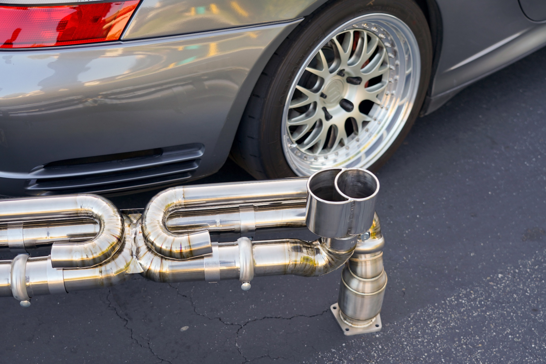 Polished slash-cut titanium exhaust tip and 200-cell sport Catalytic